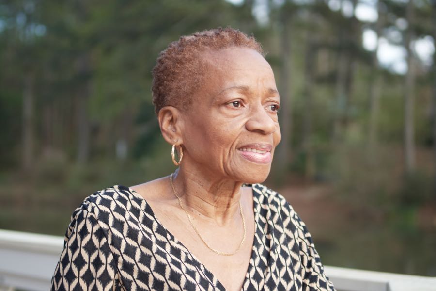 Portrait of the grandmother, looking off camera.