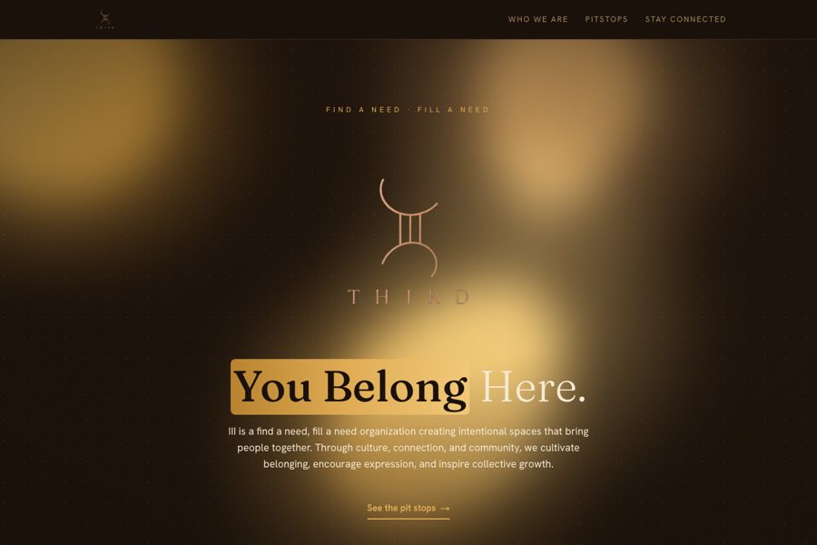 The iii.community home page: the Third monogram in gold on a dark ground above the headline You Belong Here.